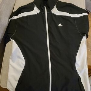 Adidas jogging suit.